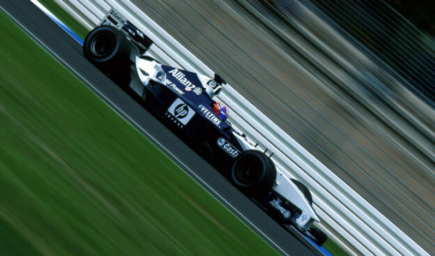 Juan Pablo Montoya racing his Williams BMW FW24