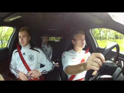 Nico Rosberg and Michael Schumacher visiting german national football team EURO 2012