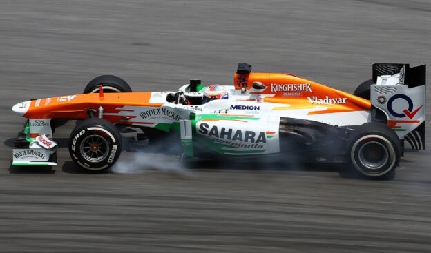 Paul di Resta racing the Force India VJM06