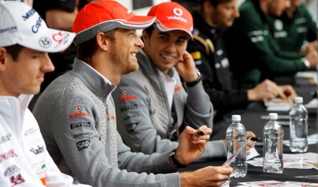 Jenson Button and Checco Perez at the autograph signing session (Large)