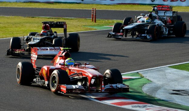 Massa (Ferrari) followed by Raikkonen (Lotus) and Perez (McLaren)