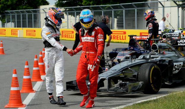 Jenson Button congratulates Fernando Alonso