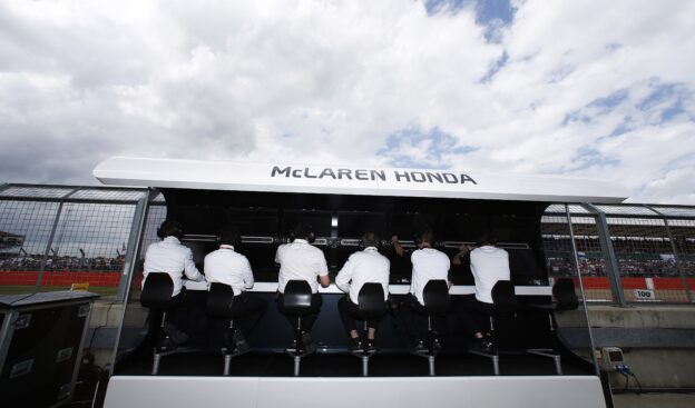 Mclaren team at work on the pit wall.