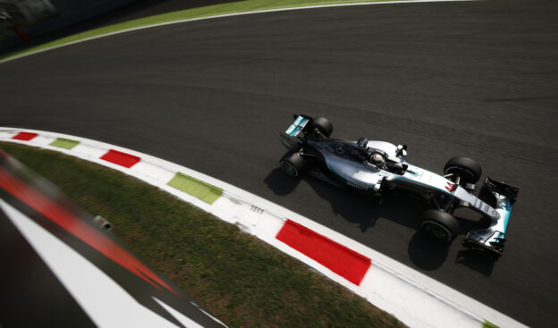 Lewis Hamilton driving his Mercedes W06 in Parabolica corner at Monza