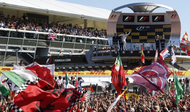 Felipe Massa, Williams F1, 3rd Position, celebrates as he arrives on the podium.