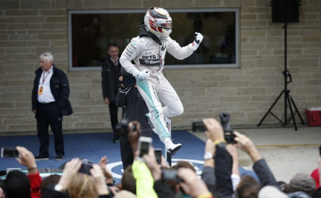 Lewis Hamilton jumps of his W06 Mercedes