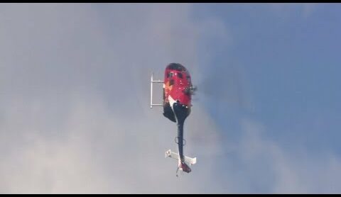 F1 driver Mark Webber does helicopter backflip!