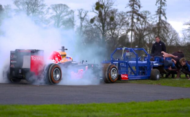 F1 Car vs. 8-Men Rugby Team