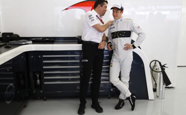 Eric Boullier and Stoffel Vandoorne in the garage.