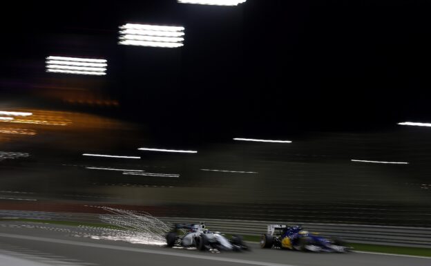 Felipe Massa, Williams FW38 Mercedes passes Marcus Ericsson, Sauber C35 Ferrari