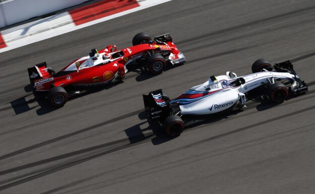 Valtteri Bottas, Williams FW38 Mercedes, battles with Kimi Raikkonen, Ferrari SF16-H