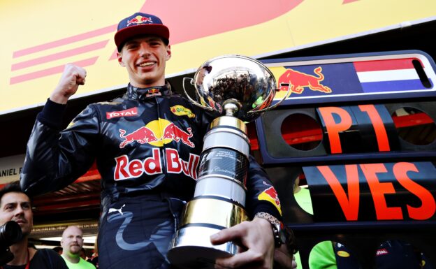 Max Verstappen celebrates his win with his trophy during the Spanish Formula One Grand Prix at Circuit de Catalunya on May 15, 2016