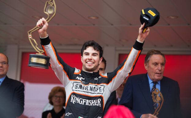 Sergio Perez celebrates his third position on the Monaco podium