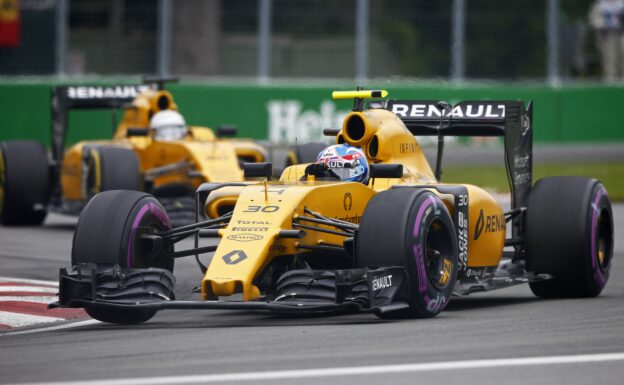 Jolyon Palmer and Kevin Magnussen driving their Renault RS16 at Canada