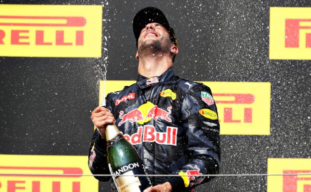 Daniel Ricciardo celebrates on the podium after finishing third in the Formula One Grand Prix of Hungary 2016.