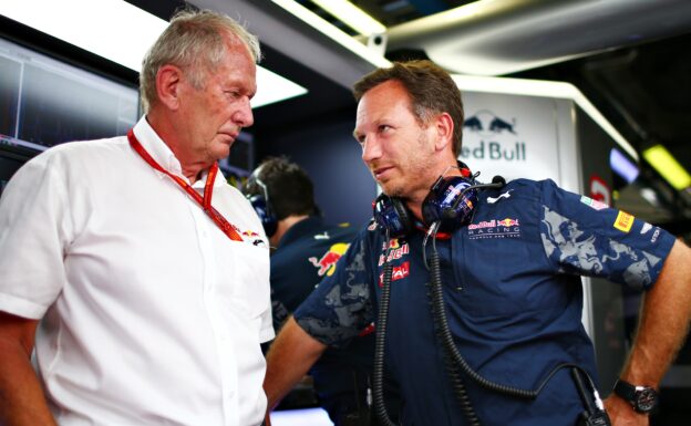 MONZA, ITALY F1/2016: Red Bull Racing Team Principal Christian Horner speaks with Red Bull Racing Team Consultant Dr Helmut Marko in the garage during practice.