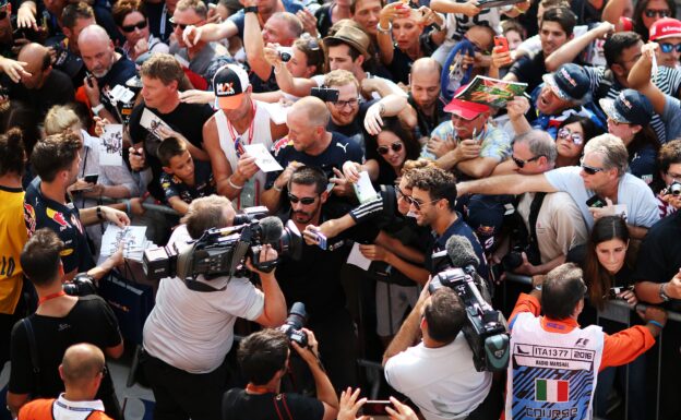 MONZA, ITALY F1/2016: Daniel Ricciardo of Red Bull Racing gets his photo taken with a fan.