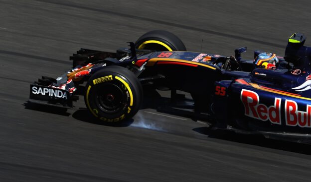 Carlos Sainz driving the (55) Scuderia Toro Rosso STR11 Ferrari 060/5 turbo locks a wheel under braking on track during practice for the 2016 Malaysia Formula One Grand Prix at Sepang Circuit