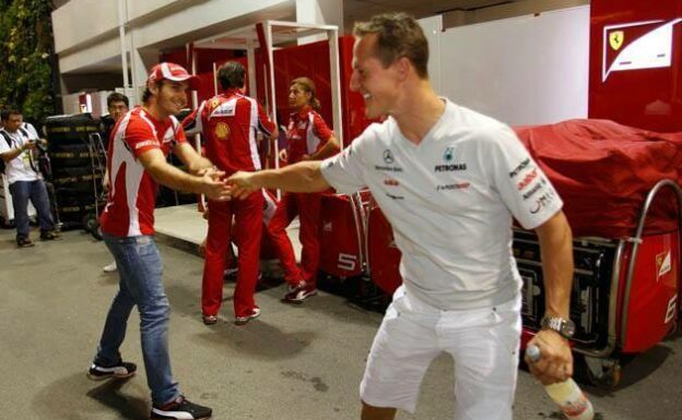 Bianchi & Schumacher shake hands