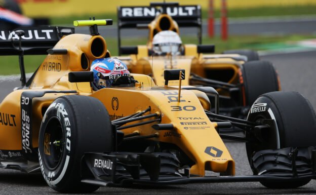 Jolyon Palmer leads team mate Kevin Magnussen at Japanese Grand Prix