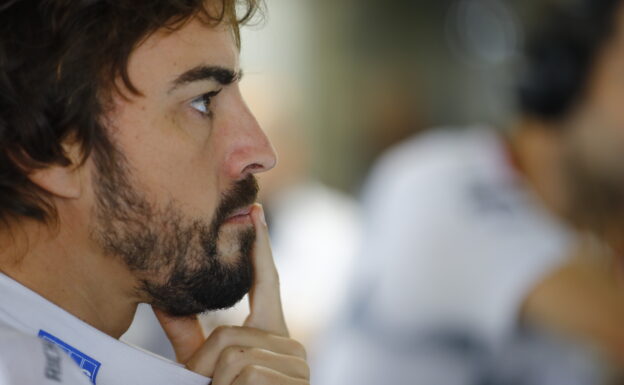 Fernando Alonso in the garage.