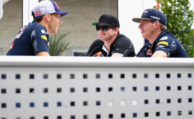 Max Verstappen talks with IndyCar driver Conor Daly of United States and Pierre Gasly of France and Red Bull Racing in the Paddock during previews ahead of the United States Formula One Grand Prix 2016.