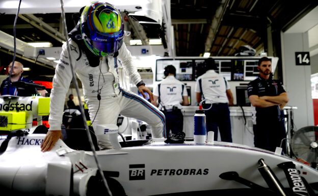 Japanese GP F1/2016 Felipe Massa, Williams Martini Racing, climbs in to his car.