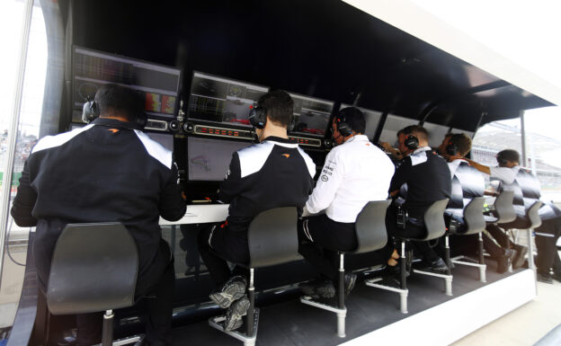 McLaren The team at work on the pit wall.