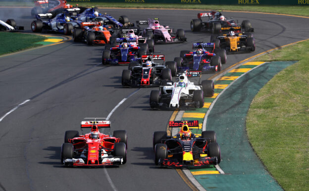 Max Verstappen driving the (33) Red Bull RB13 battles for position with Kimi Raikkonen driving the (7) Scuderia Ferrari SF70H on track during the Australian Formula One Grand Prix at Albert Park on March 26, 2017 in Melbourne.