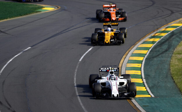 Albert Park, Melbourne, Australia. Sunday 26 March 2017. Lance Stroll, Williams FW40 Mercedes, leads Jolyon Palmer, Renault R.S.17, and Stoffel Vandoorne, McLaren MCL32 Honda.