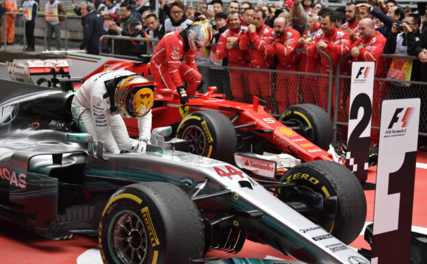 Formula One - Mercedes-AMG Petronas Motorsport, Chinese GP 2017. Lewis Hamilton; Ferrari Sebastian Vettel