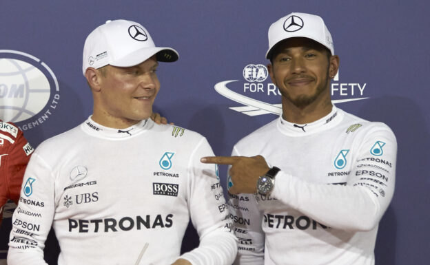 Valterri Bottas & Lewis Hamilton after Bottas scores his first pole for Mercedes