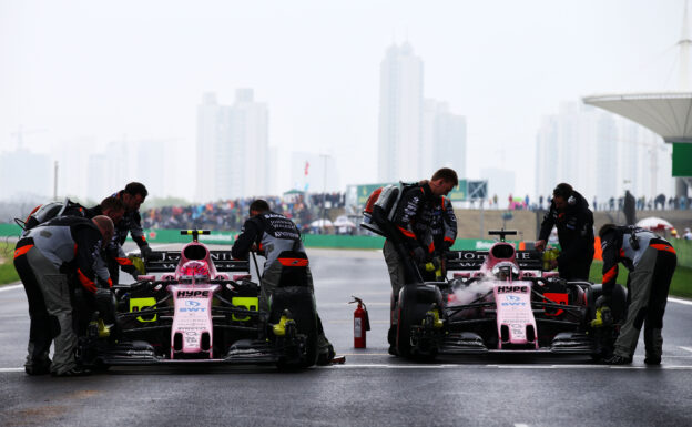 Esteban Ocon (FRA) Sahara Force India F1 VJM10 and Sergio Perez (MEX) Sahara Force India F1 VJM10 on the grid. Chinese Grand Prix, Sunday 9th April 2017. Shanghai, China.