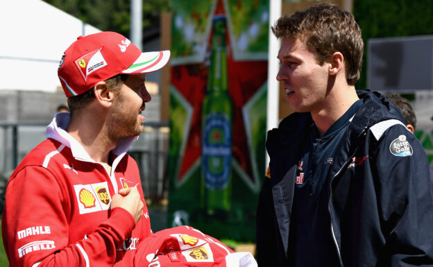 Sebastian Vettel of Ferrari talks with Daniil Kvyat of Scuderia Toro Rosso in the Paddock during previews for the Spanish Formula One Grand Prix at Circuit de Catalunya on May 11, 2017 in Montmelo, Spain.