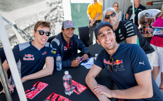 Carlos Sainz of Scuderia Toro Rosso and Spain and Daniil Kvyat of Scuderia Toro Rosso and Russia during previews for the Canadian Formula One Grand Prix at Circuit Gilles Villeneuve on June 8, 2017 in Montreal, Canada.