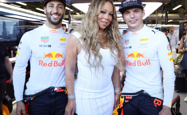 Singer Mariah Carey poses with Red Bull Racing drivers Daniel Ricciardo (L) of Australia and Max Verstappen of the Netherlands prior to the Azerbaijan Formula One Grand Prix at Baku City Circuit on June 25, 2017 in Baku, Azerbaijan.