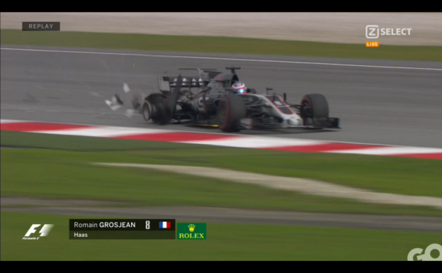 Romain Grosjean crashes because of a loose drain cover