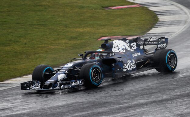 Red Bull RB14 driven by Daniel Ricciardo on a wet Silverstone