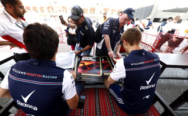 Bahrain GP F1/2018 Lance Stroll, Williams Racing, and Sergey Sirotkin, Williams Racing, signs autographs for fans.