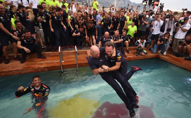 Adrian Newey, the Chief Technical Officer of Red Bull Racing and Red Bull Racing Team Principal Christian Horner celebrate the race win of Daniel Ricciardo of Australia and Red Bull Racing in the swimming pool of the Red Bull Energy Station after the Monaco Formula One Grand Prix at Circuit de Monaco on May 27, 2018 in Monte-Carlo, Monaco.