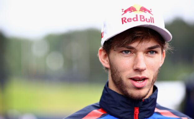 Pierre Gasly of France and Scuderia Toro Rosso talks to the media in the Paddock during previews ahead of the Formula One Grand Prix of Austria at Red Bull Ring on June 28, 2018 in Spielberg, Austria.