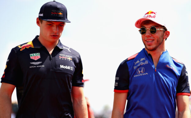 Max Verstappen of Netherlands and Red Bull Racing and Pierre Gasly of France and Scuderia Toro Rosso talk on the drivers parade befire the Formula One Grand Prix of Hungary at Hungaroring on July 29, 2018 in Budapest, Hungary.