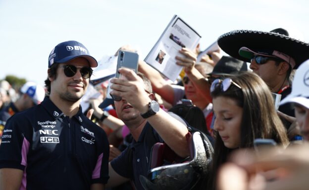 Lance Stroll, Racing Point poses for a photograph with a fan French GP F1/2019