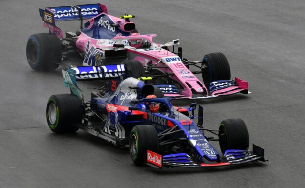 Alexander Albon (23) Toro Rosso STR14 Honda leads Lance Stroll (18) Racing Point RP19 Mercedes on track during the F1 Grand Prix of Germany at Hockenheimring on July 28, 2019 (Photo by Dan Mullan/Getty Images)