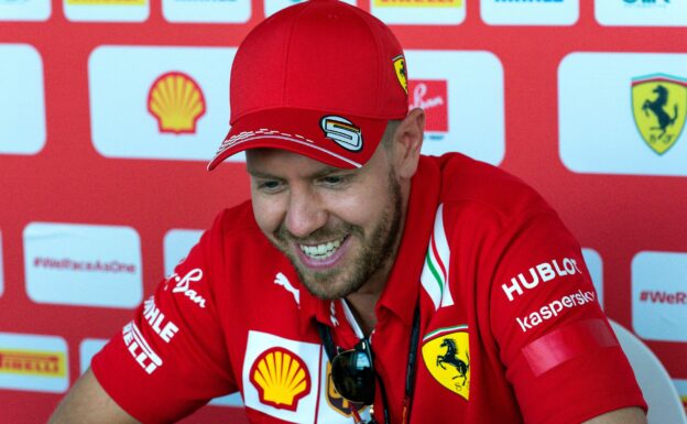 Vettel says Ferrari not slowing him down